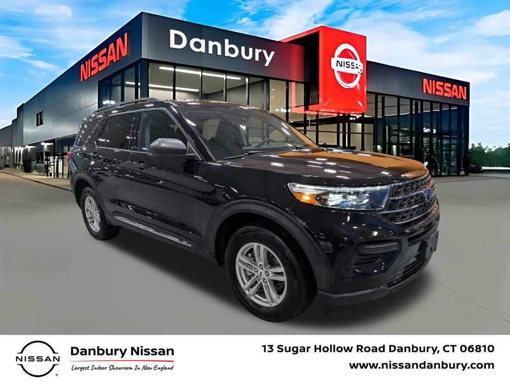 2023 Ford Explorer XLT in Black Metallic — front three-quarter view