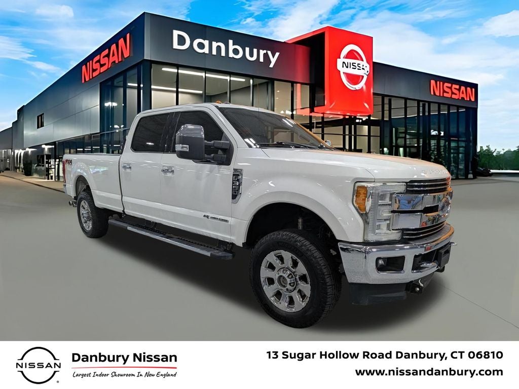 2018 Ford F-350SD Lariat in White Platinum Clearcoat Metallic — front three-quarter view
