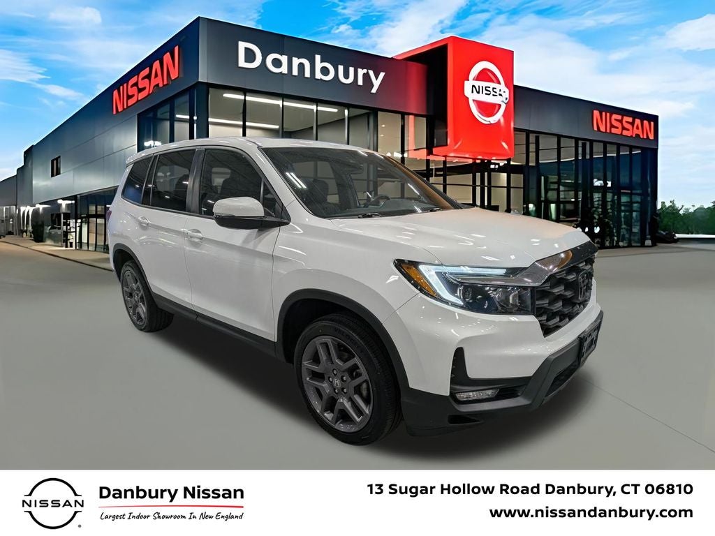 2022 Honda Passport EX-L in Platinum White — front three-quarter view