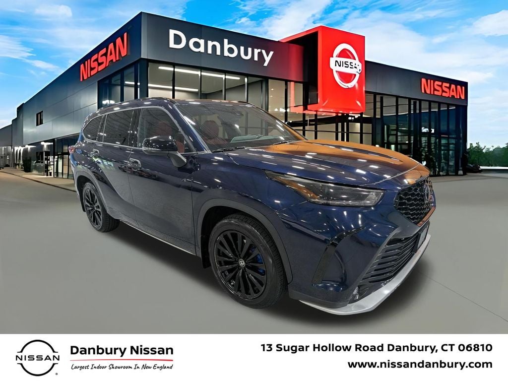 2023 Toyota Highlander XSE in Blueprint — front three-quarter view