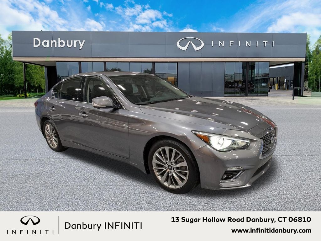 2023 INFINITI Q50 LUXE AWD in Graphite Shadow — front three-quarter view